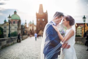 Connie & Fodo - Pre-Wedding photo shooting in Prague Groom and Bride on Charles Bridge in Prague