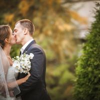 Irina & Eugene - beautiful wedding in Prague - Kissing Couple in Prague Garden